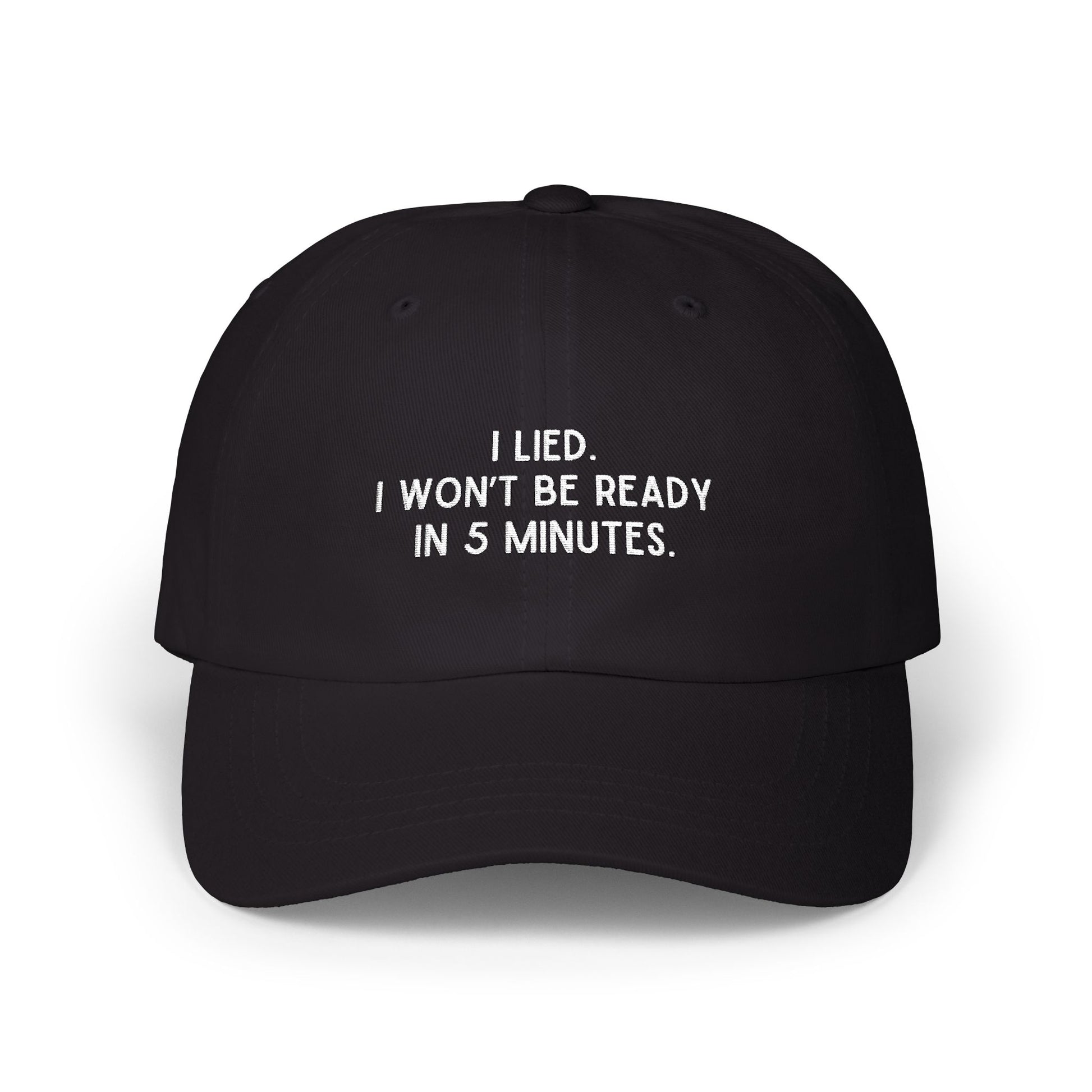 Front view of black embroidered dad hat reading I Lied I wont be ready in 5 minutes