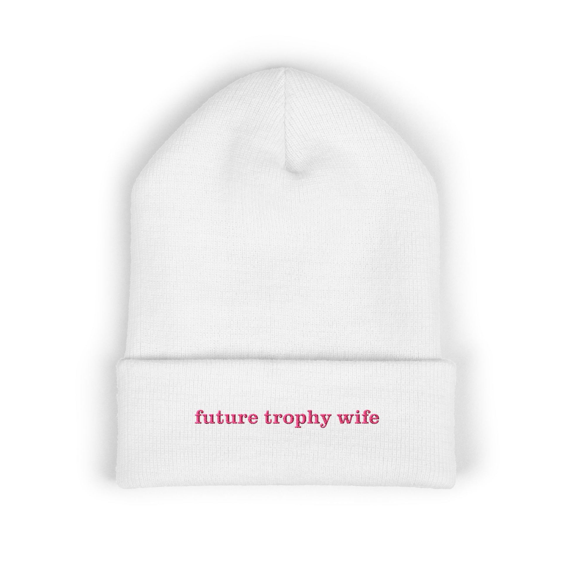White beanie with 'future trophy wife' text in pink on a white background